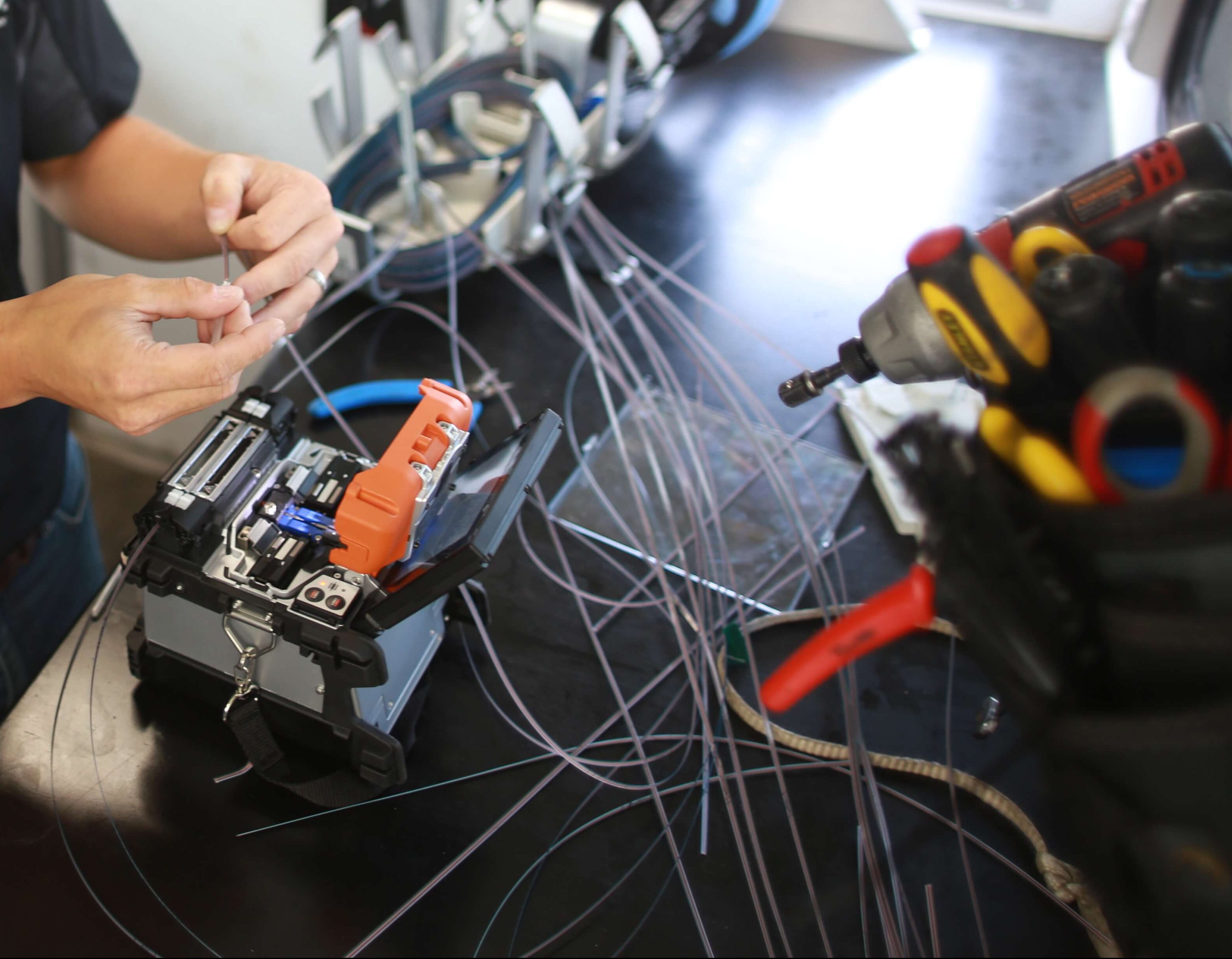 Fiber optic cable being spliced