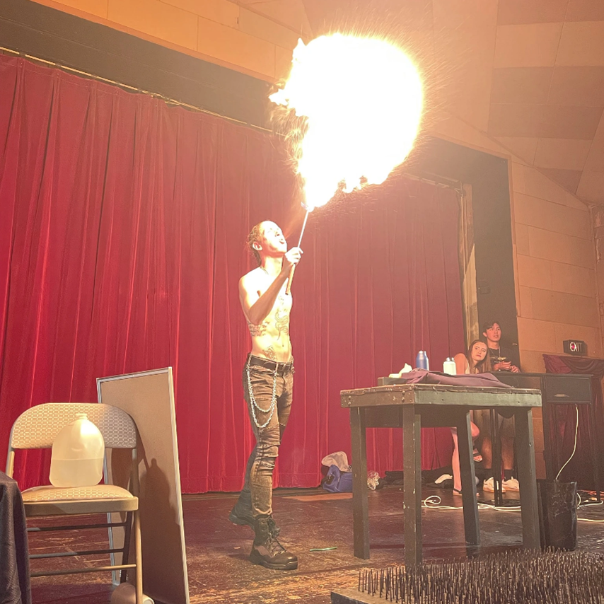 ALLO Fiber team member Isaac performing in a magic show