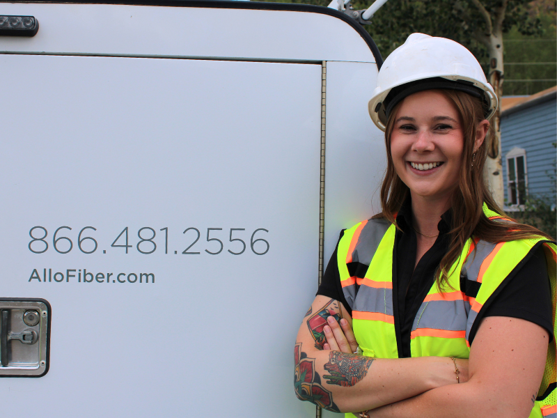ALLO Fiber Employee next to ALLO van.