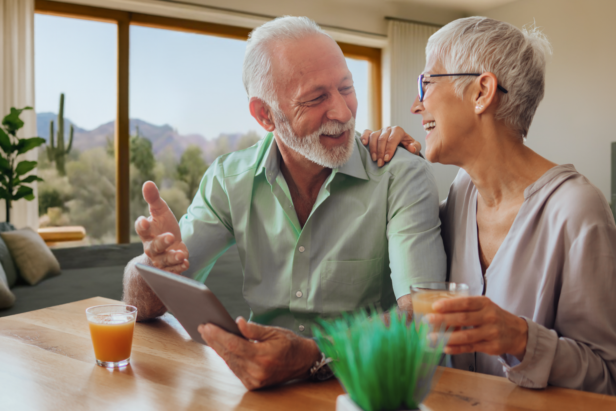 Older couple enjoying ALLO Fiber's outdoor Wi-Fi.