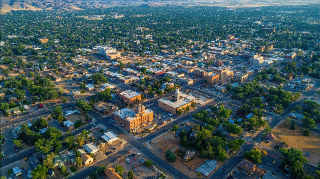 Breathtaking Aerial Perspective of Greeley, Colorado in Summer. A Drone View of the Charming Downtown Skyline